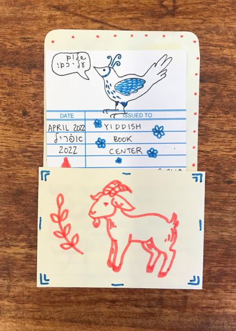 A library index with marker drawings of a goat and a bird saying "shalom aleichem"