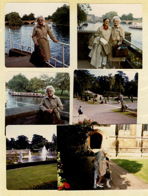 Page of a scrapbook featuring five images. Two photographs of Rochel in front of a river. A photograph Rochel with an unidentified friend in front of the same river. Two pictures of a garden with trees and a fountain. A picture of 