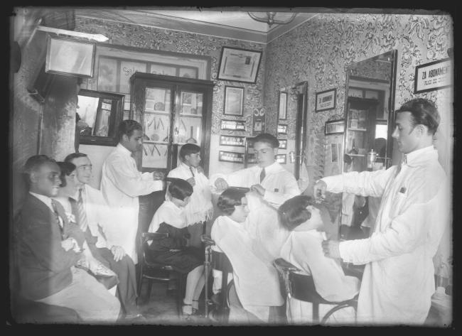 old photograph of people in a barber shop in Lublin, Poland. 
