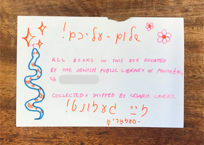 colorful note with snake and "shalom aleichem" written detailing who donated the Yiddish books