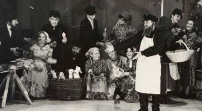 A market scene in a theatre performance