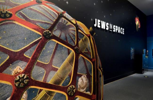 A mural of an observatory on a wall of the Jews in Space exhibit