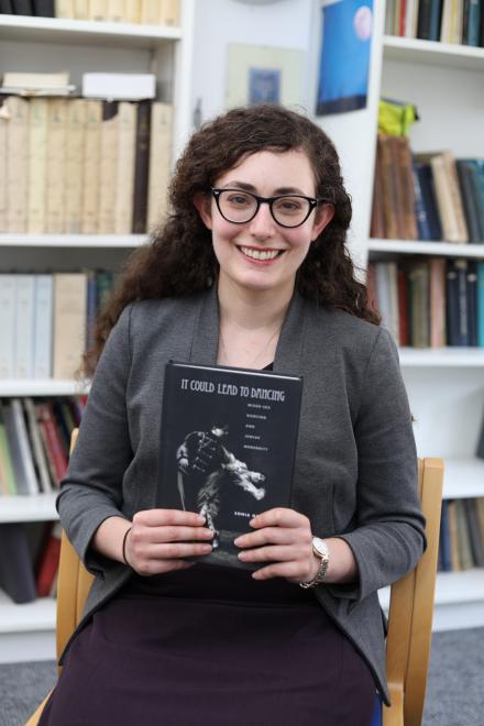 Sonia Gollance holds her recently published book, "It Could Lead to Dancing: Mixed-Sex Dancing and Jewish Modernity"