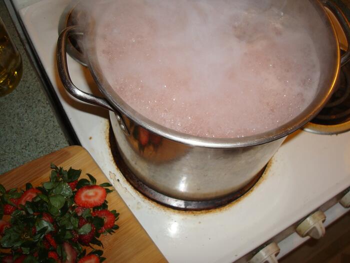Strawberry borscht in a pot