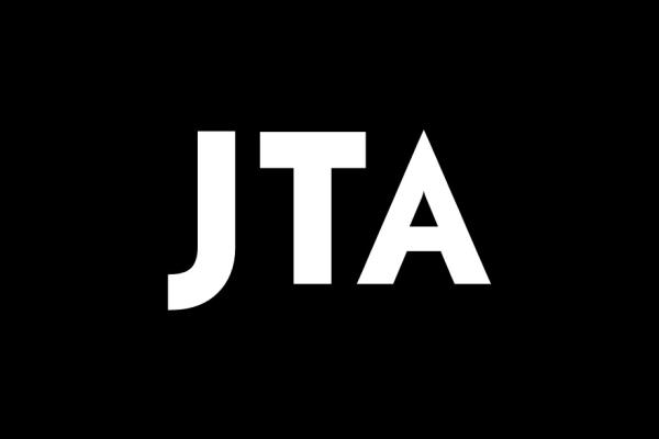Black background with white letters JTA 