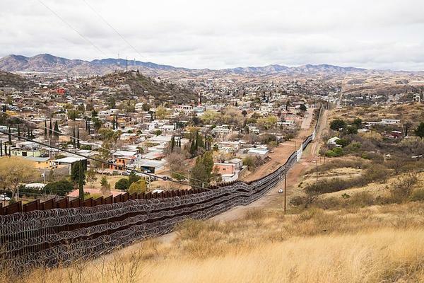 800px-Nogales_Border_Wall_and_Concertina_Wire_-_46965408602 copy.jpg